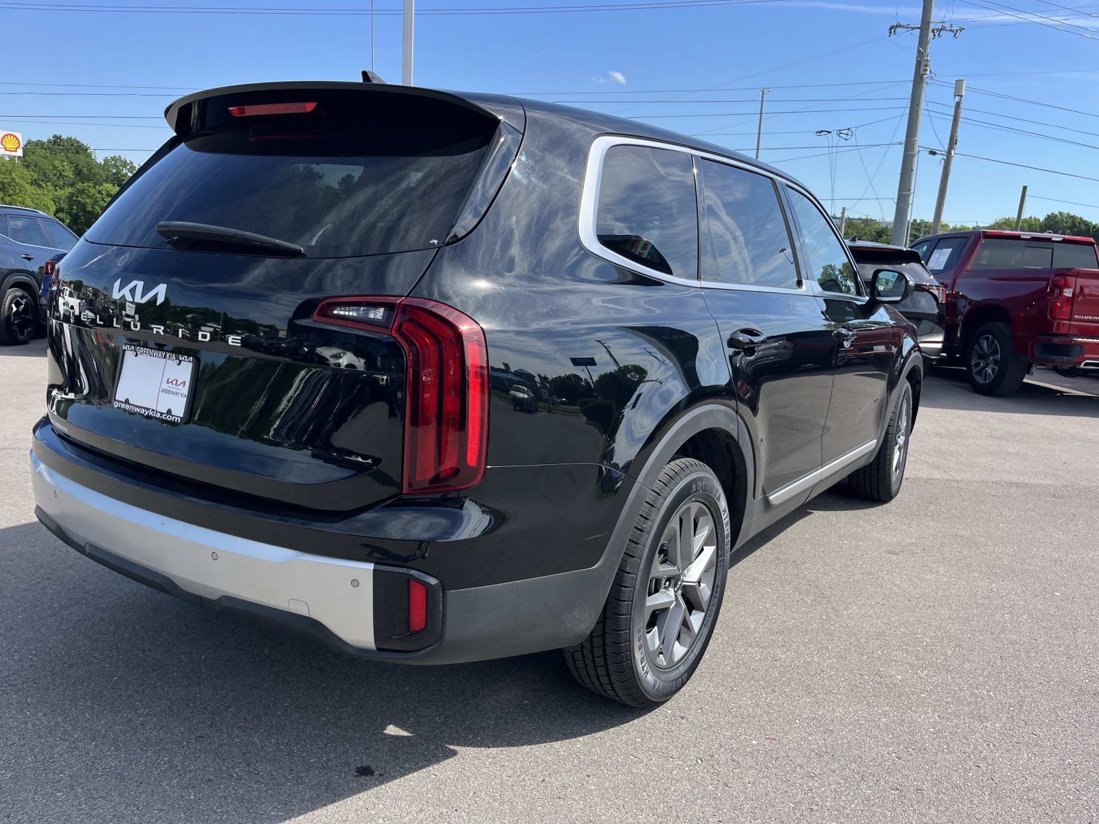 Used 2024 Ebony Black Kia LX image 3