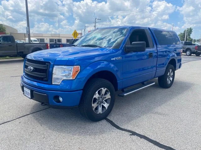Used 2013 Blue Flame Metallic Ford STX image 1