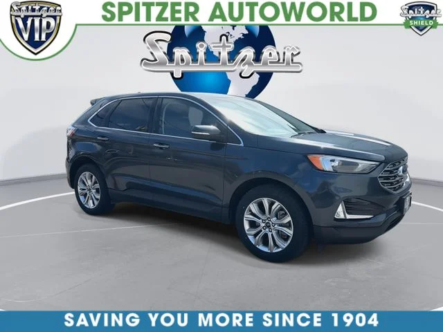 Certified Used 2024 Blue Ford Titanium image 2