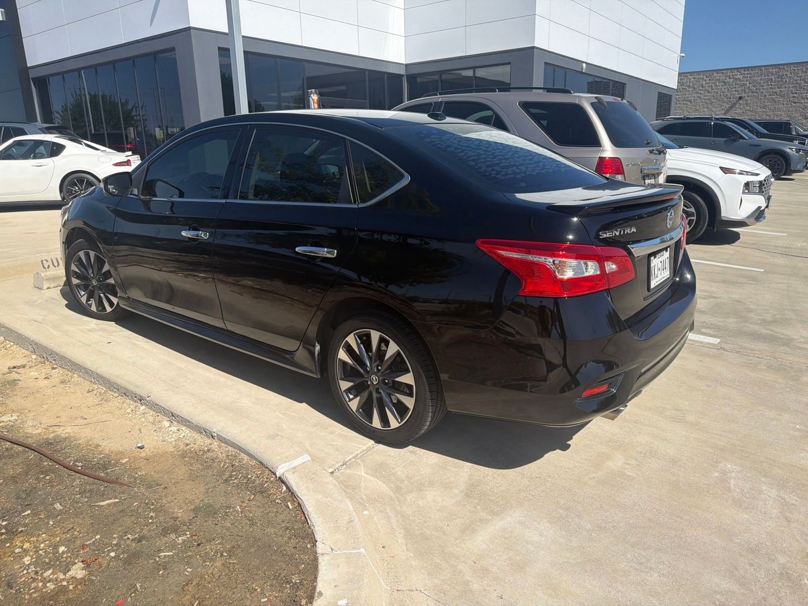 Used 2017 Super Black Nissan SR image 9