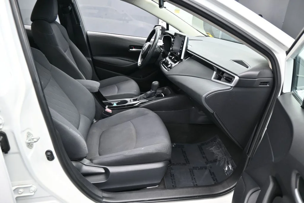 Used 2021 Super White Toyota LE image 31