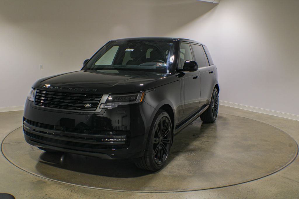 New 2026 Santorini Black Metallic Land Rover SE image 1