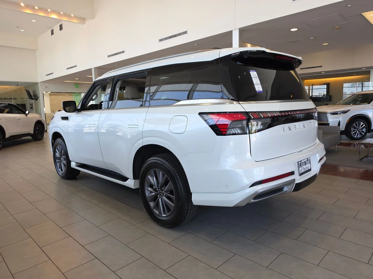 New 2026 RADIANT WHITE INFINITI Pure 4WD image 3