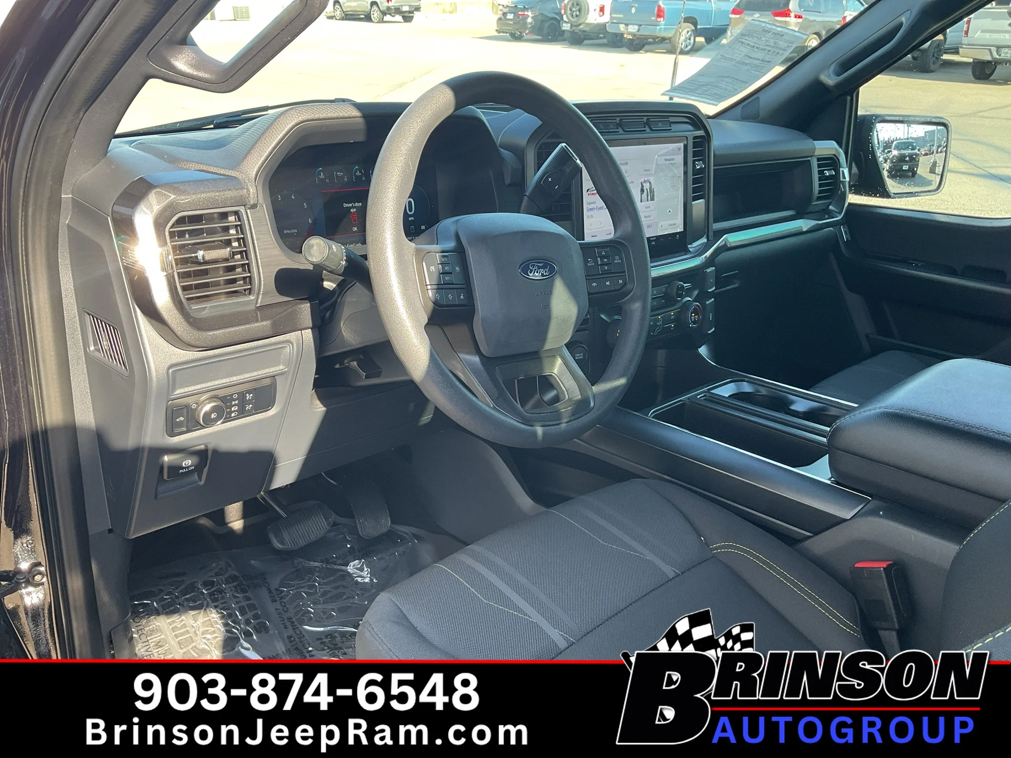 Used 2024 Agate Black Metallic Ford STX image 25