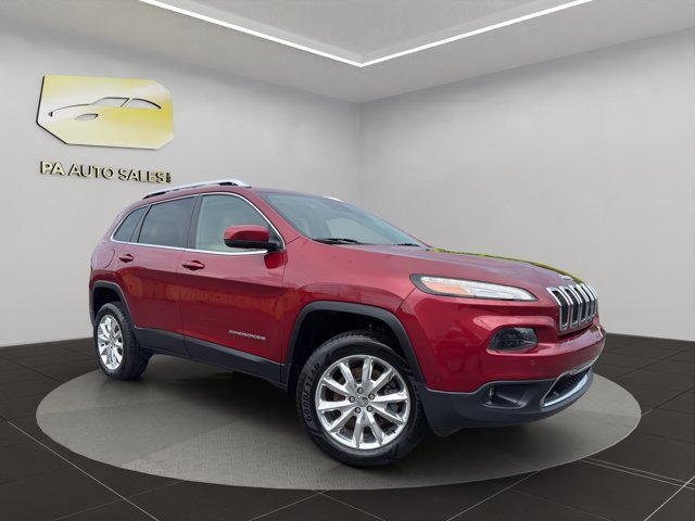 Used 2016 Deep Cherry Red Crystal Pearlcoat Jeep Limited image 1