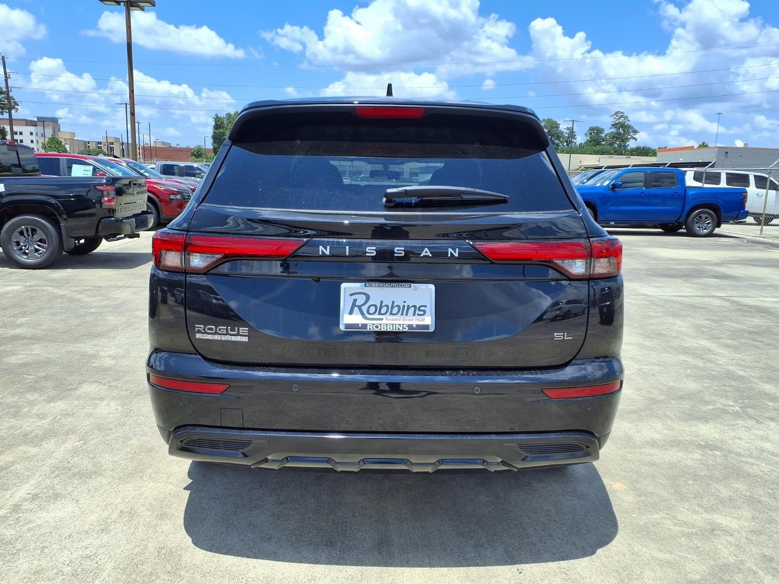 2026 Nissan Rogue Plug-In Hybrid SL Black at Sterling McCall Nissan