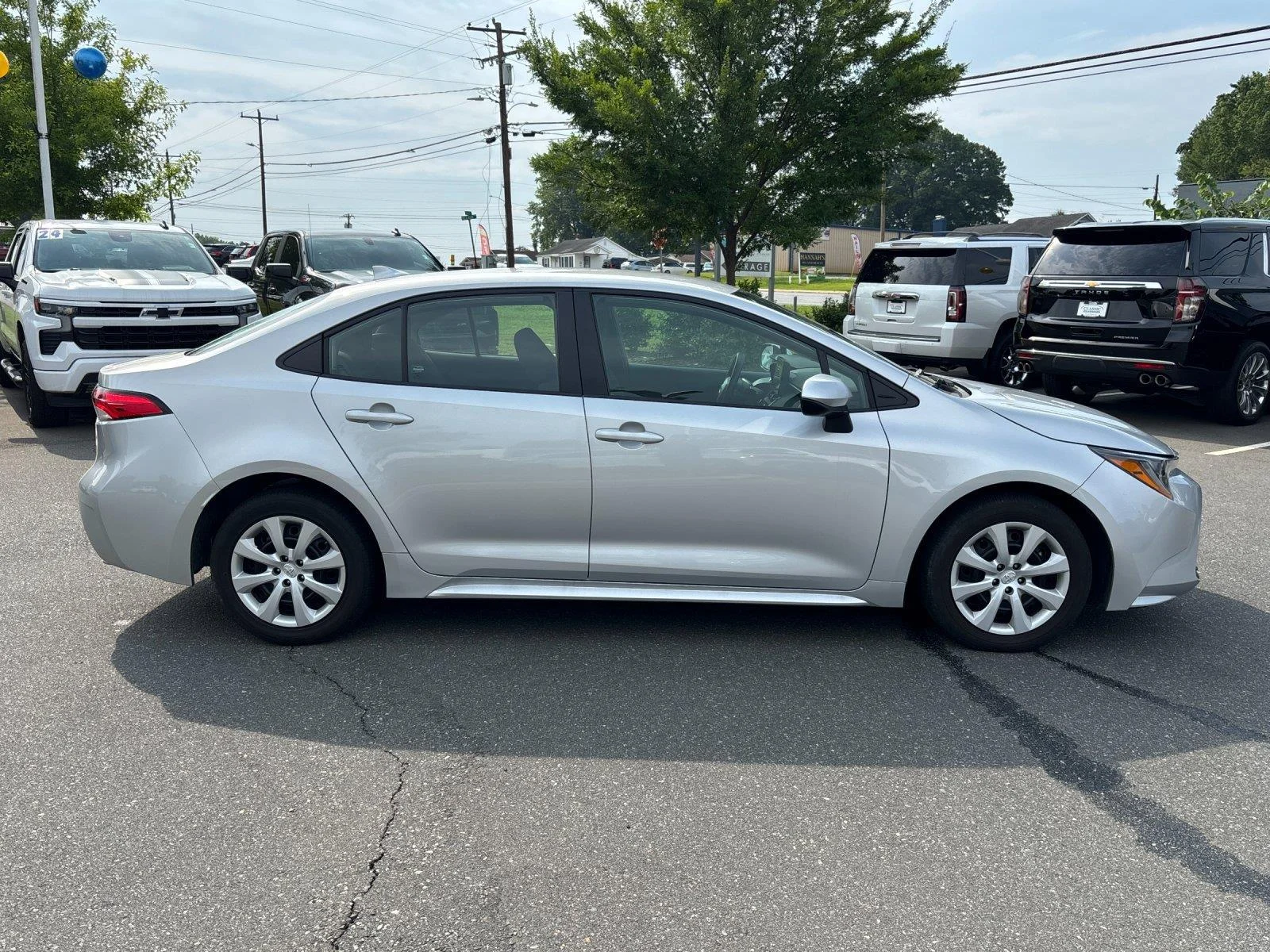 Used 2024 Classic Silver Metallic Toyota LE image 6