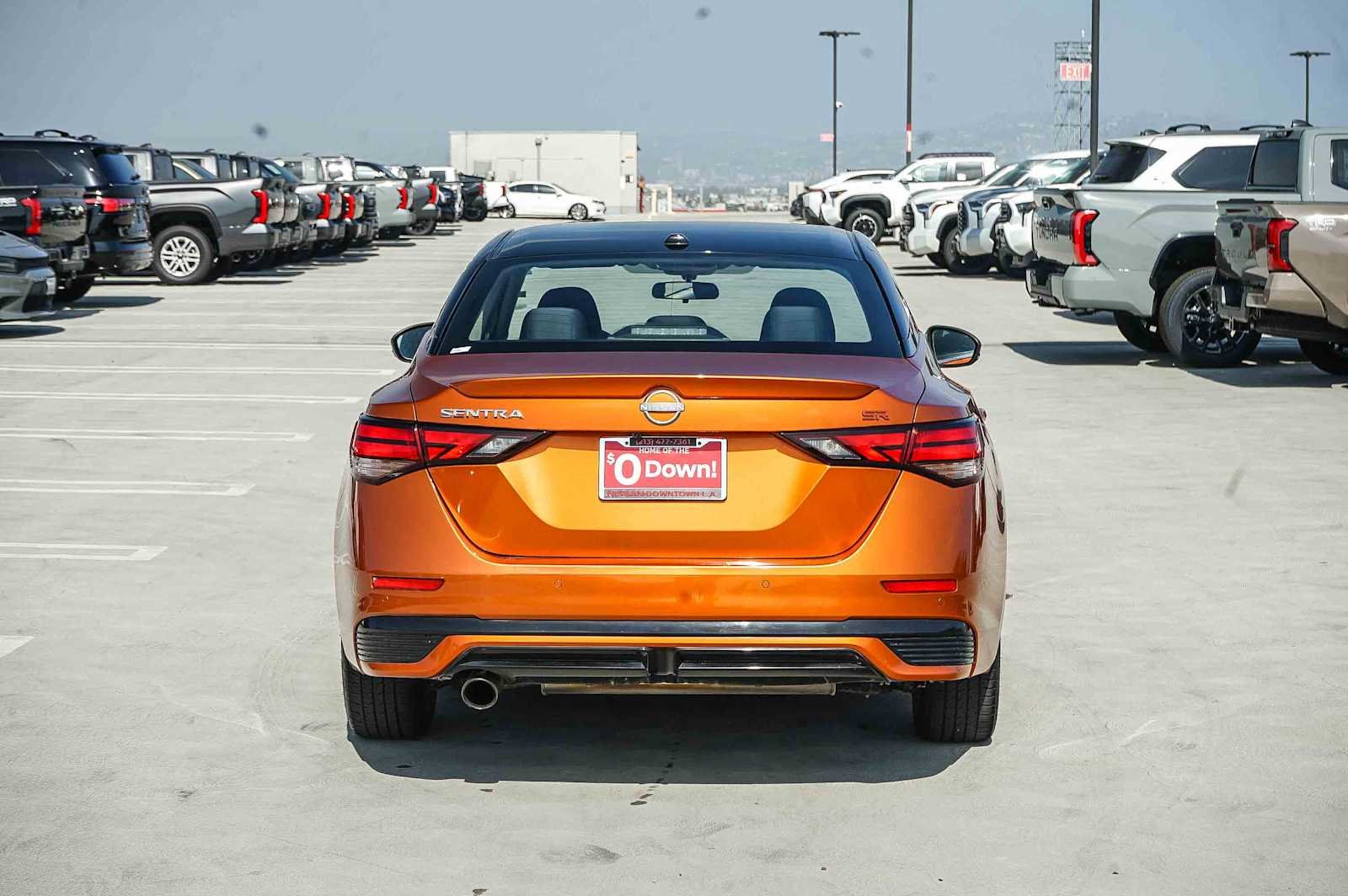 Used 2024 Monarch Orange Metallic/Super Black Nissan SR image 5