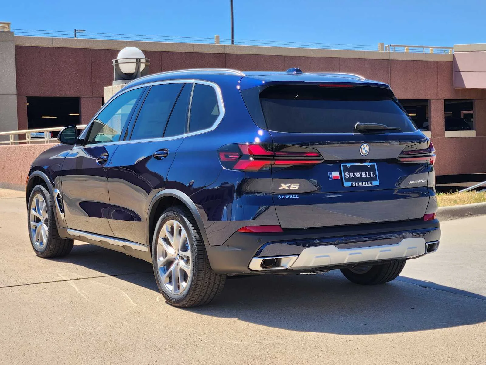 New 2026 Tanzanite Blue II Metallic BMW xDrive50e image 3