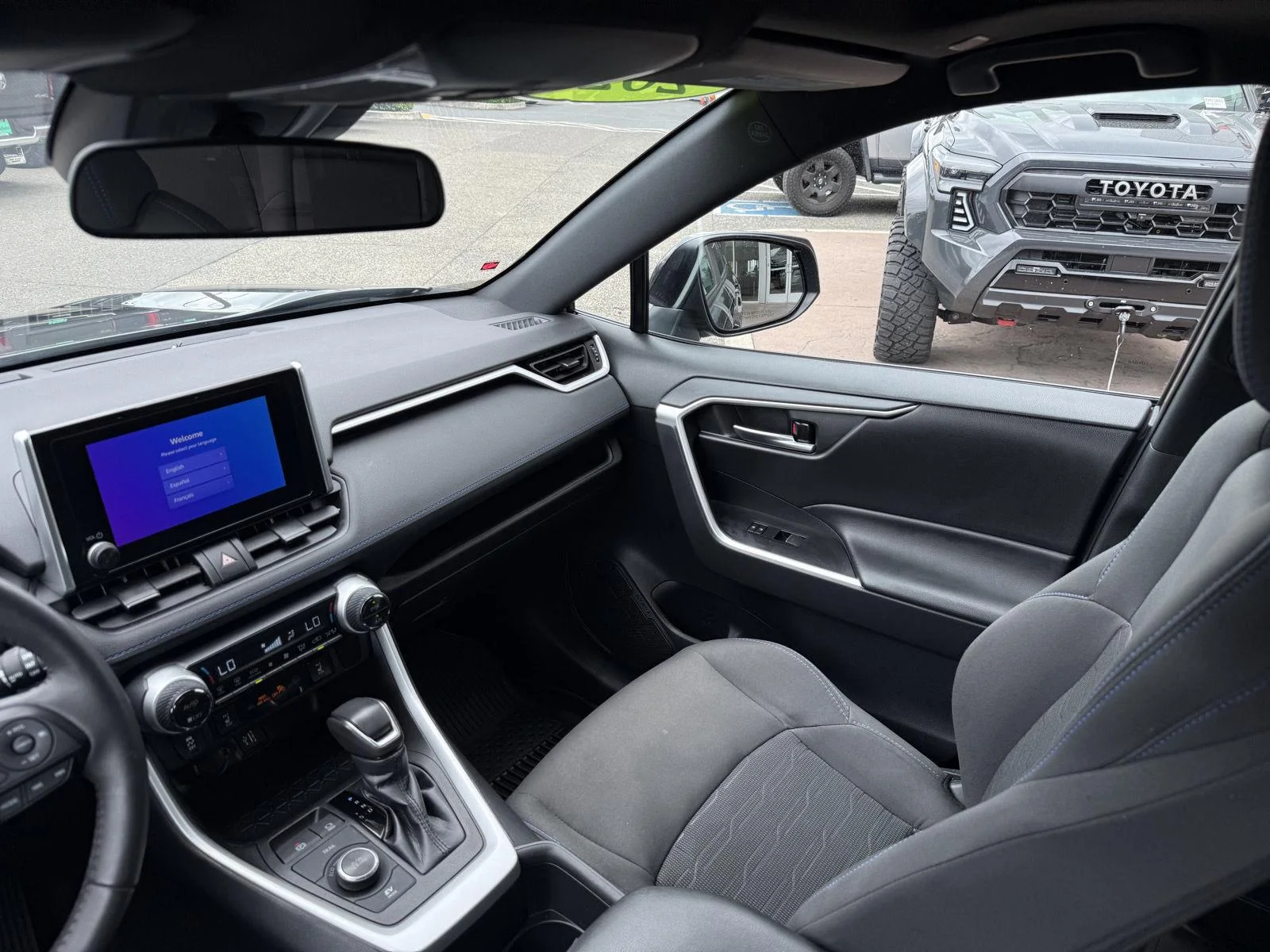 Used 2023 Magnetic Gray Metallic Toyota Hybrid SE image 16