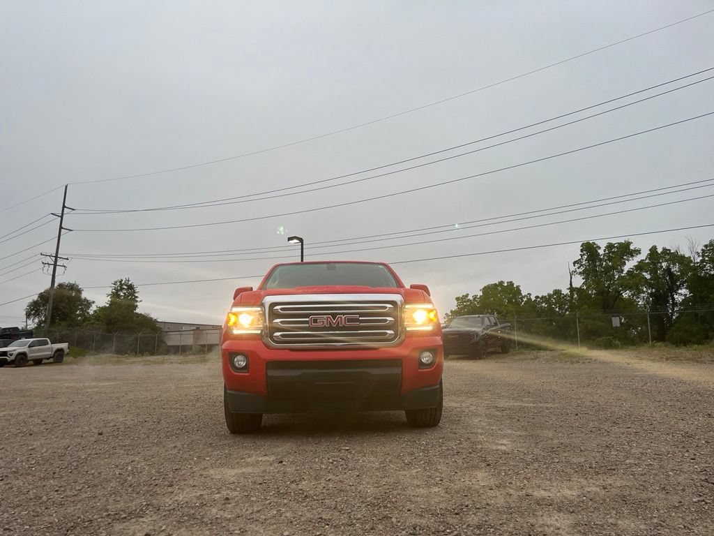 Used 2016 CARDINAL RED GMC 4WD SLE image 4