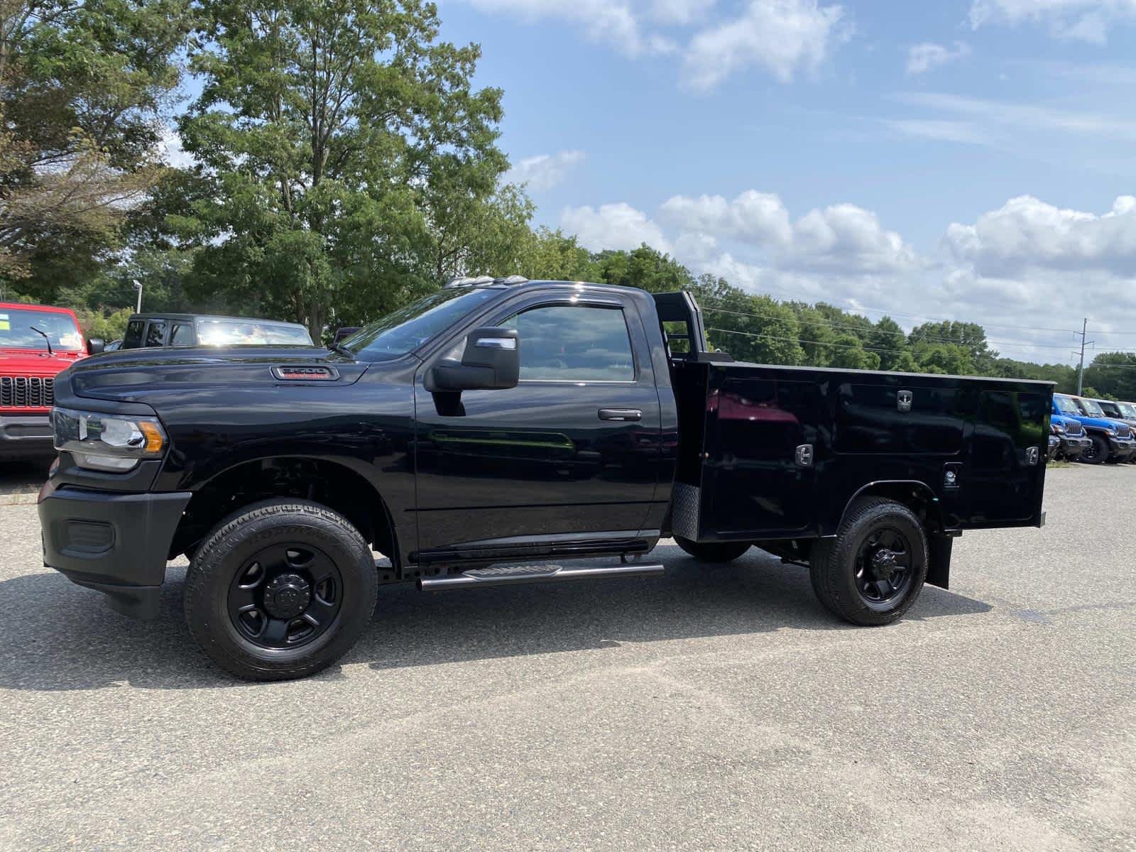 Used 2024 Diamond Black Crystal Pearlcoat Ram Tradesman image 8