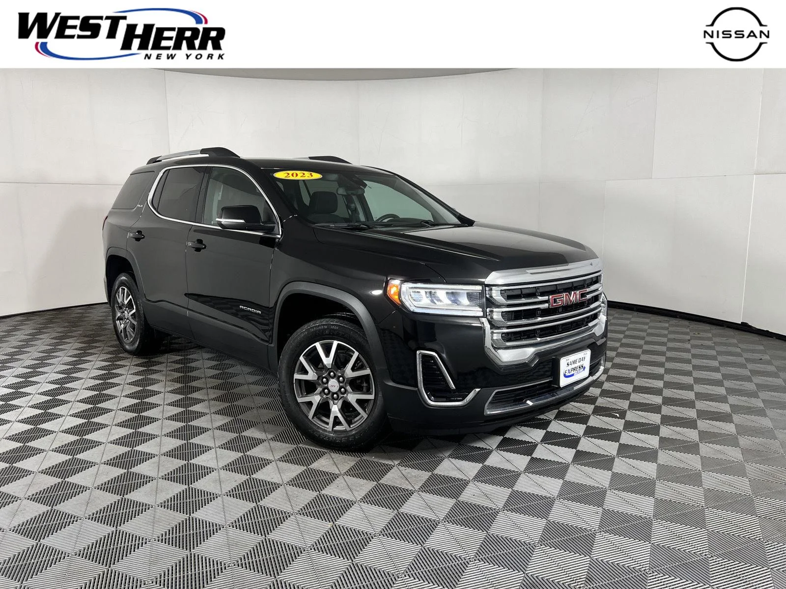 Used 2023 Ebony Twilight Metallic GMC SLE image 1