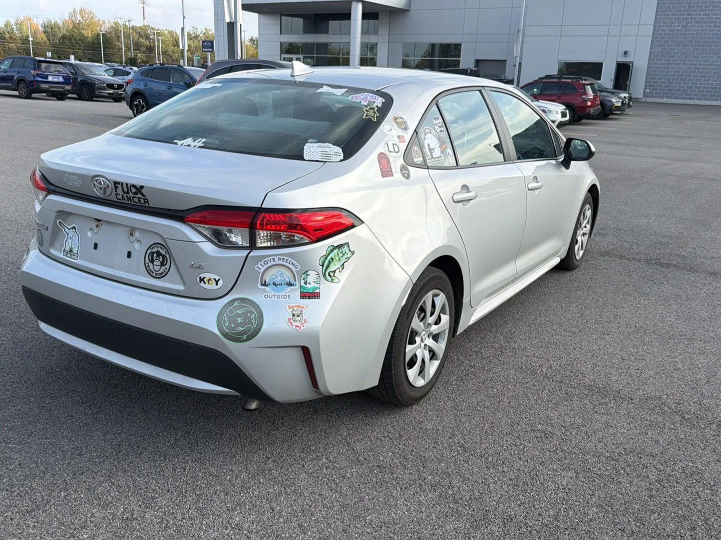 Used 2021 Classic Silver Metallic Toyota LE image 3