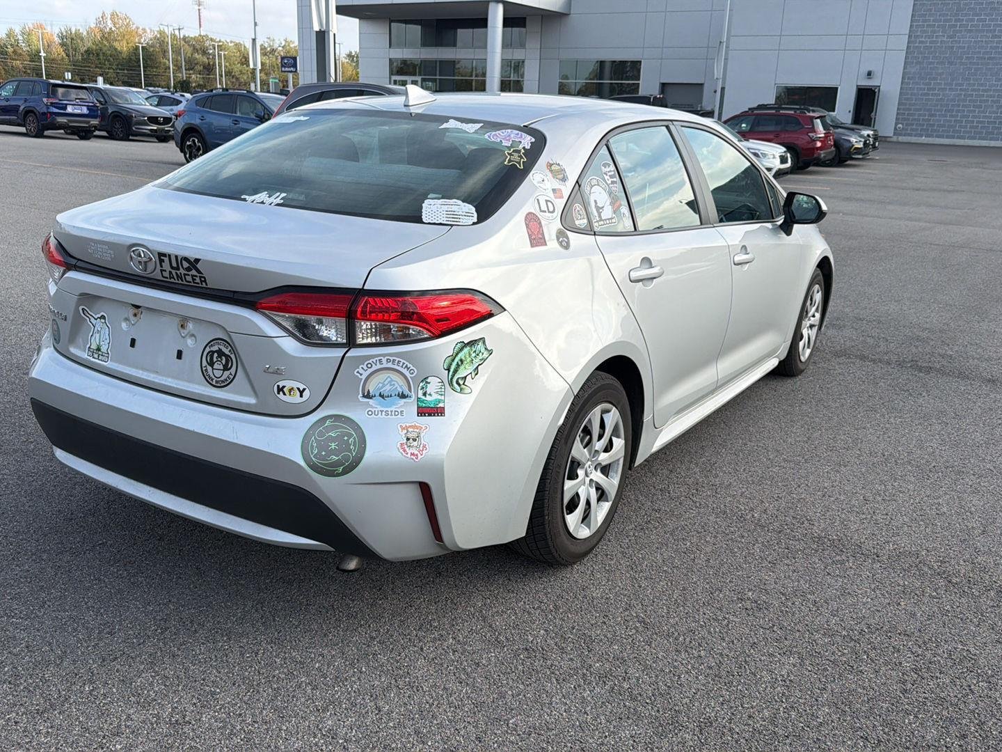 Used 2021 Classic Silver Metallic Toyota LE image 3