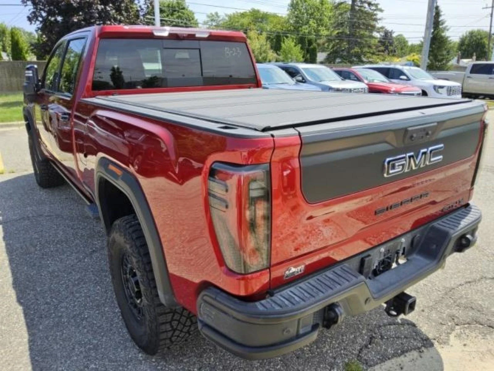 Used 2026 Volcanic Red Tintcoat GMC AT4X image 4