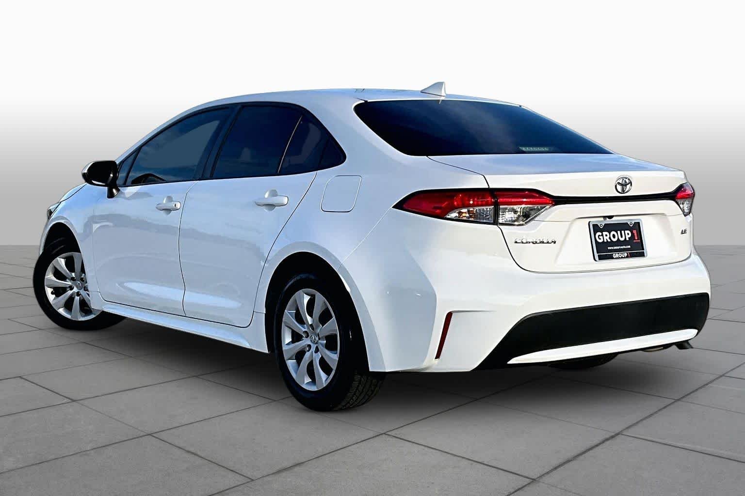 Used 2021 Super White Toyota LE image 12