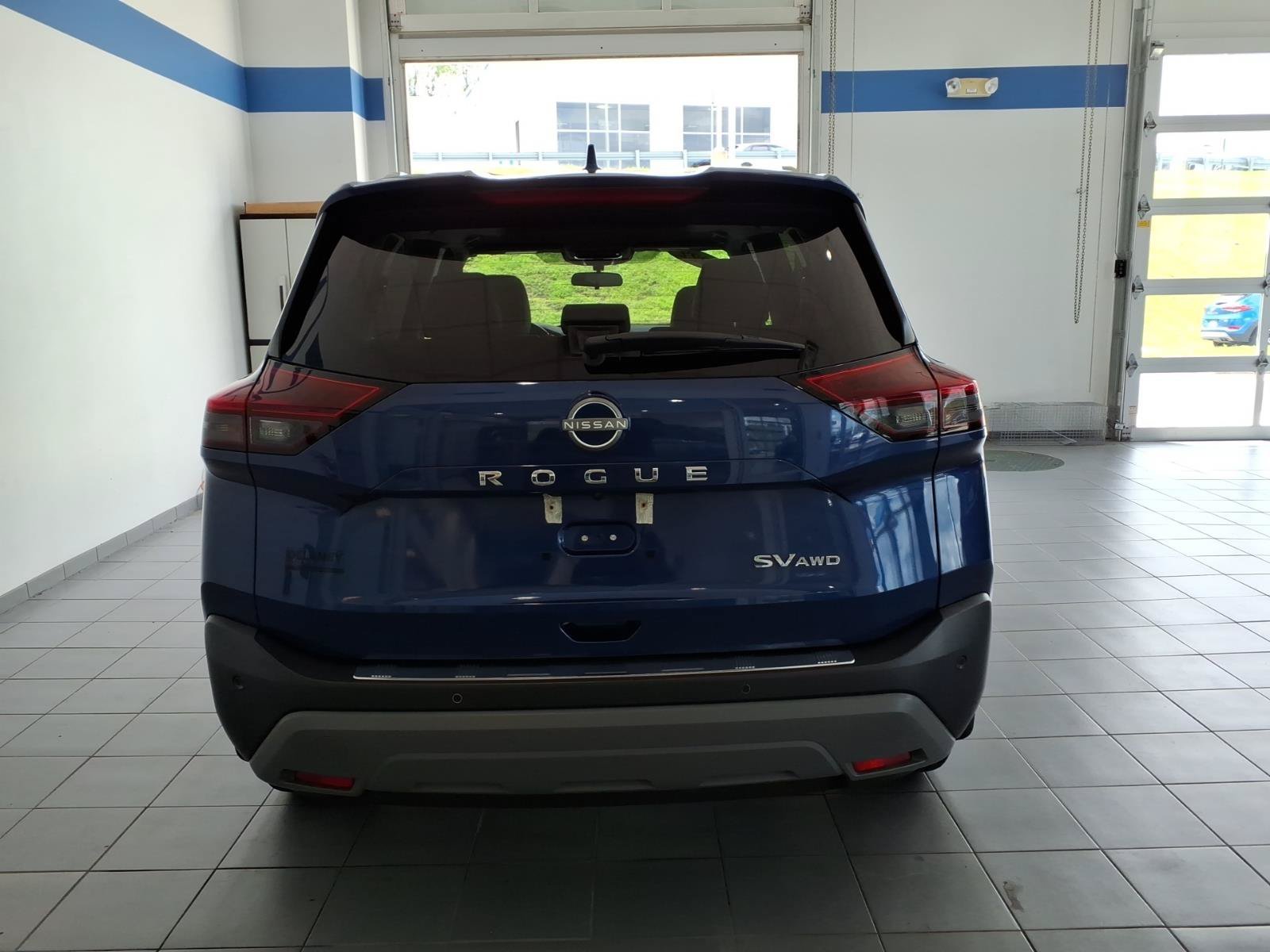 Used 2022 Caspian Blue Metallic Nissan SV image 6
