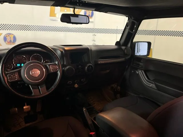 Used 2014 Billet Metallic Clearcoat Jeep Unlimited Sport image 11