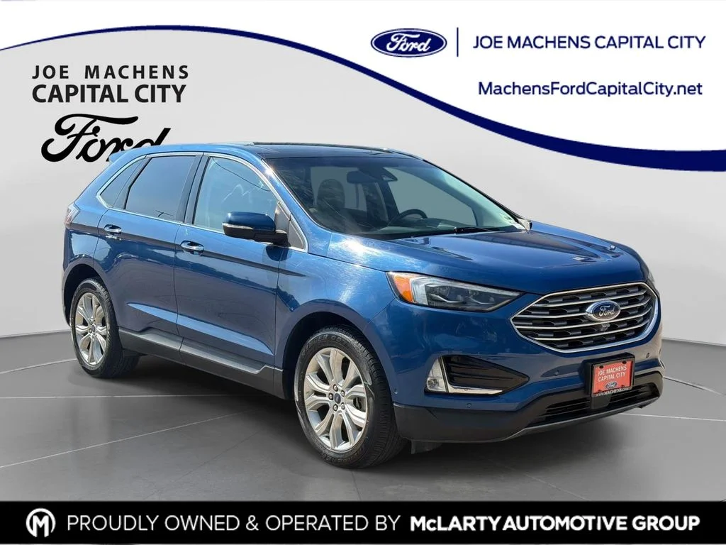 Used 2020 Blue Ford Titanium image 1
