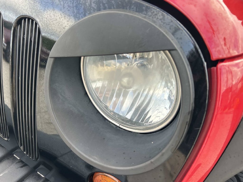 Used 2011 Flame Red Jeep Sport image 10