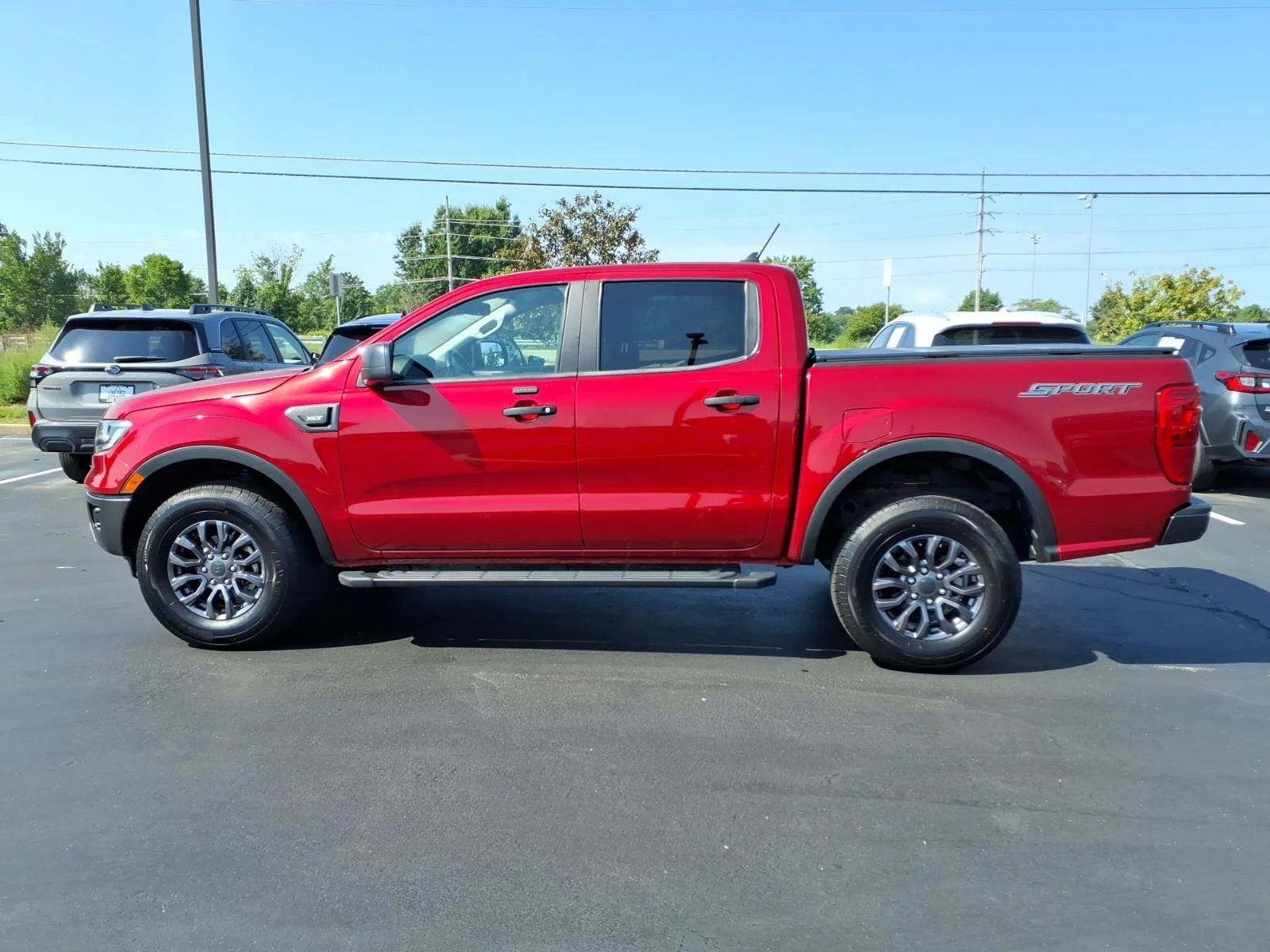 Used 2021 Rapid Red Metallic Tinted Clearcoat Ford XLT image 4