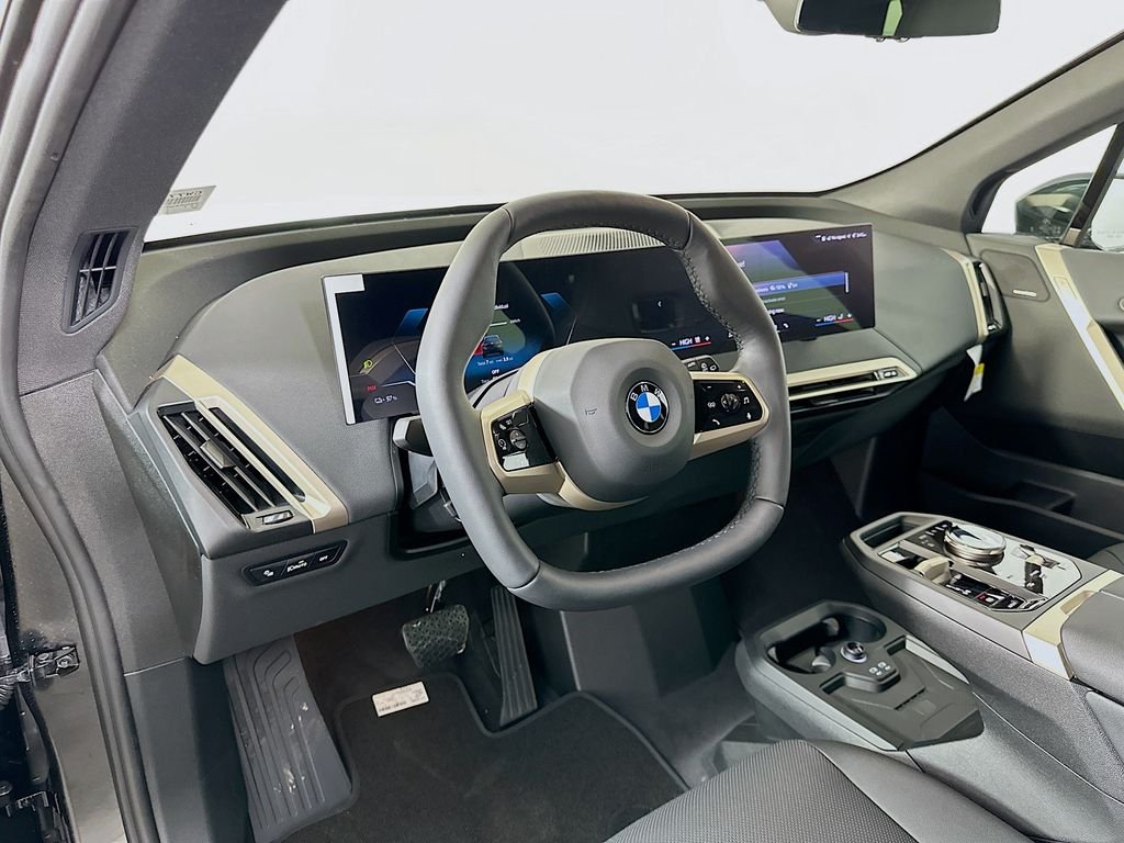 Used 2026 Black Sapphire Metallic BMW xDrive60 image 9
