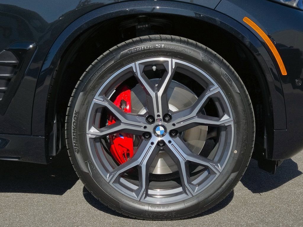New 2026 Black Sapphire Metallic BMW xDrive50e image 9
