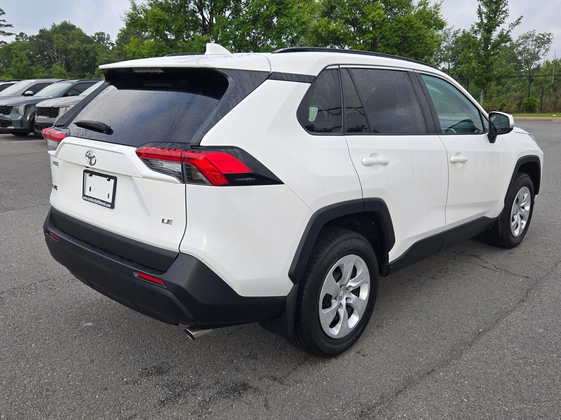 Used 2021 Super White Toyota LE image 9