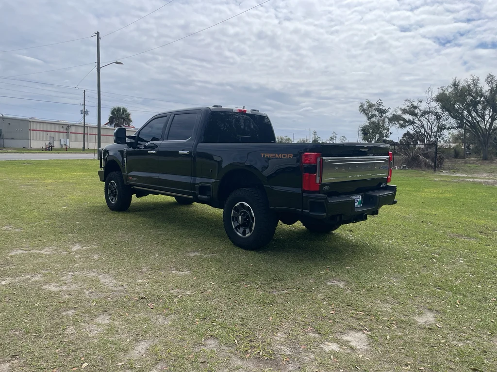 Used 2024 Black Ford Platinum Crew 4x4 H/O w/Tremor pkg image 3
