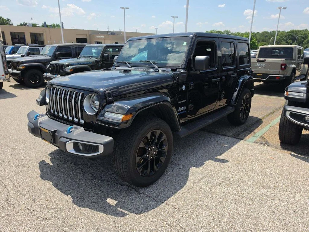 Used 2023 Black Jeep Sahara 4xe image 1