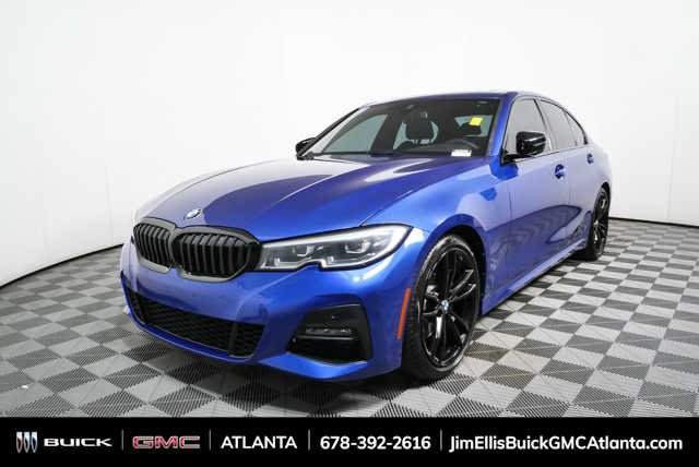 Used 2021 Portimao Blue Metallic BMW 330i image 32