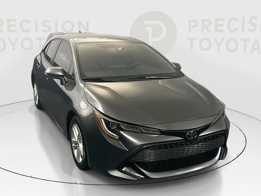 Used 2021 Magnetic Gray Metallic Toyota SE image 1