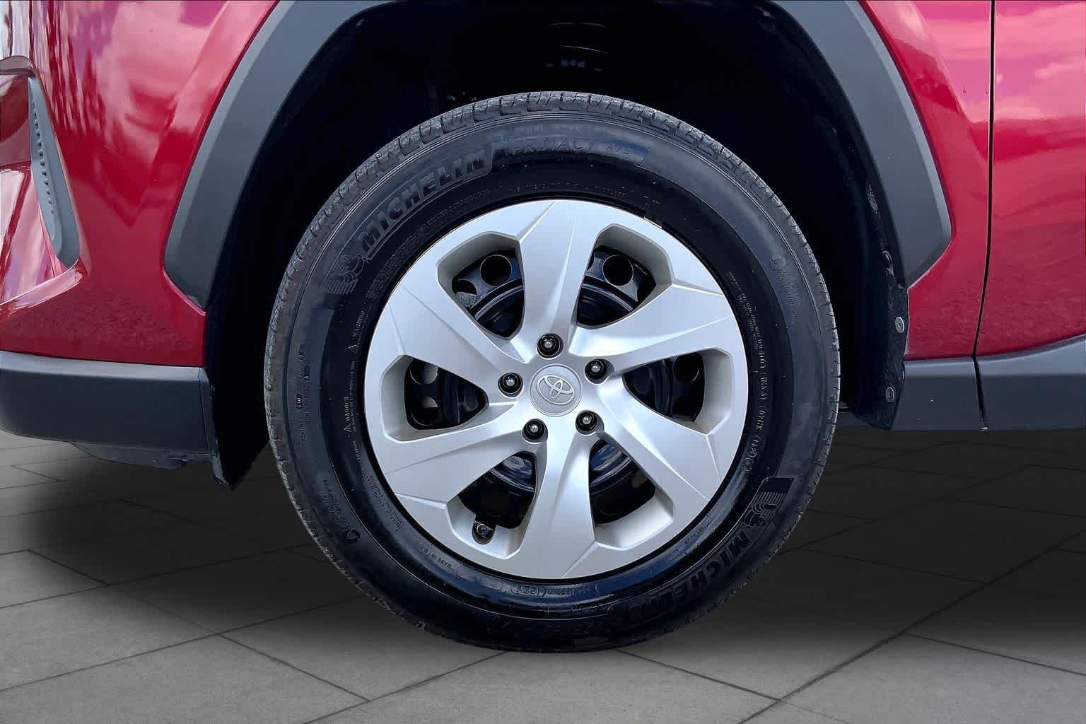 Used 2021 Ruby Flare Pearl Toyota LE image 11
