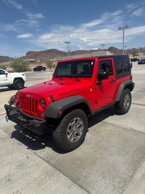 Used 2015 Red Jeep Rubicon image 1