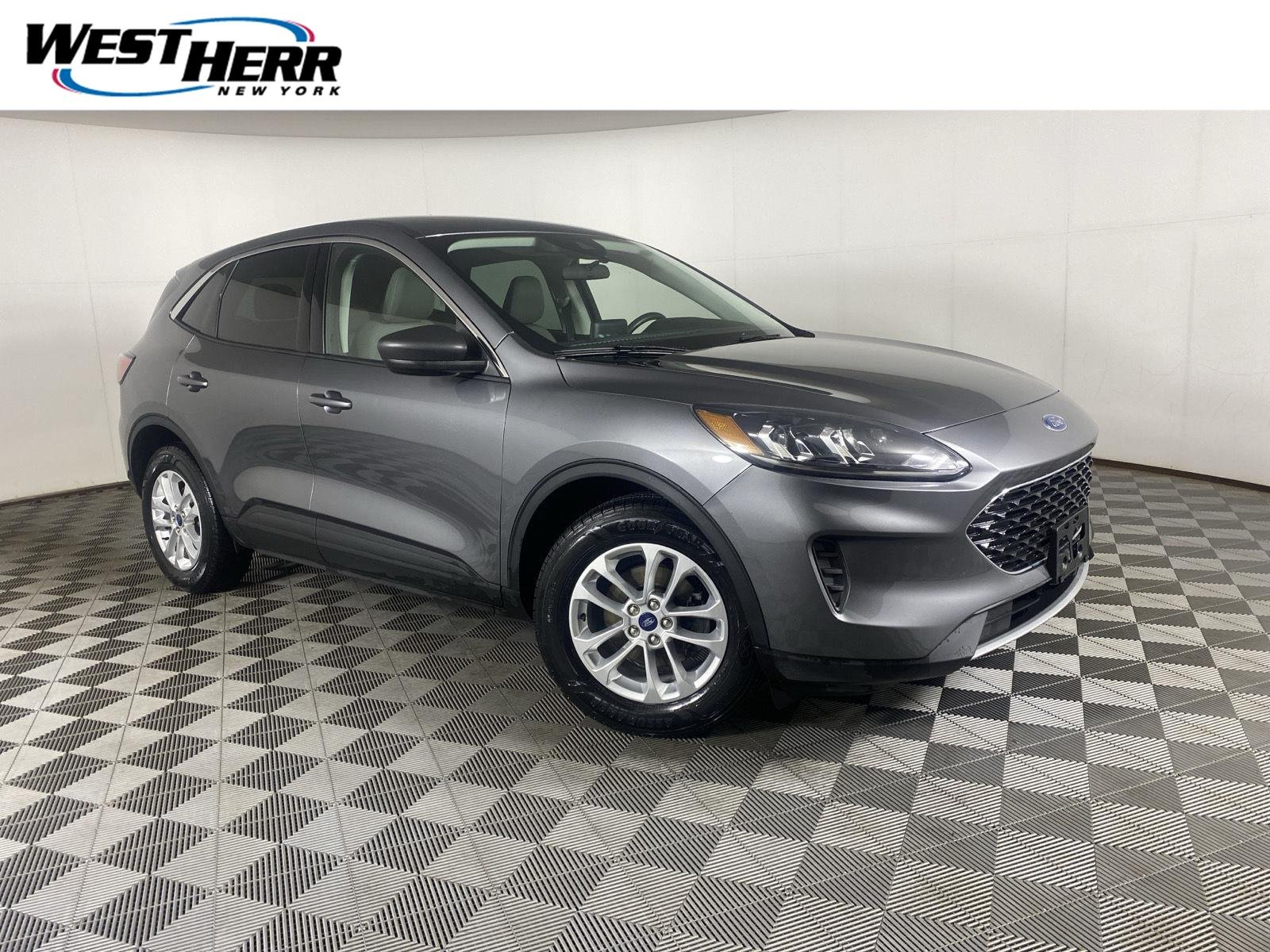 Used 2022 Carbonized Gray Ford SE image 1