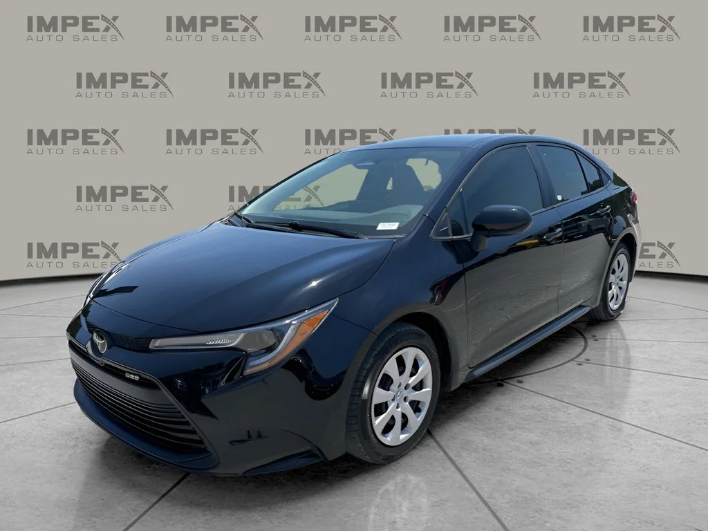 Used 2024 Black Toyota LE image 1