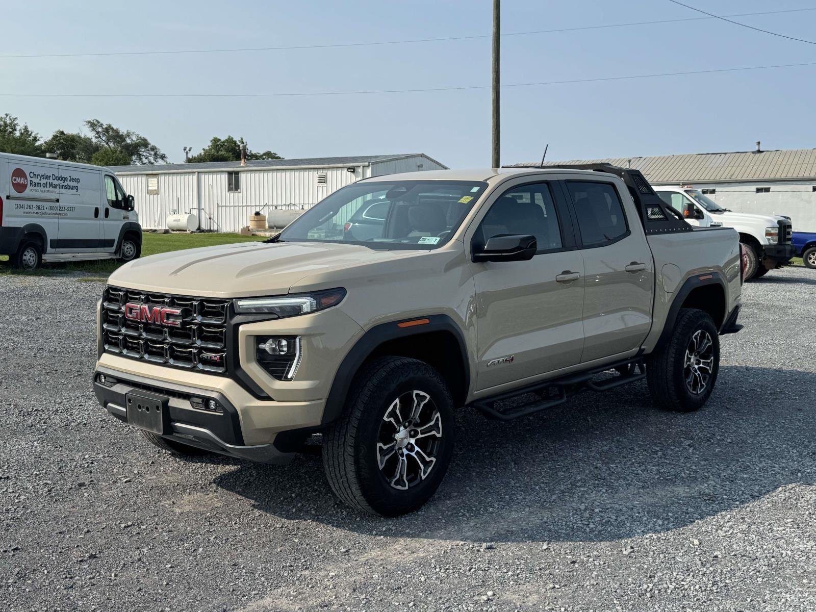 Used 2023 Desert Sand Metallic GMC 4WD AT4 image 25