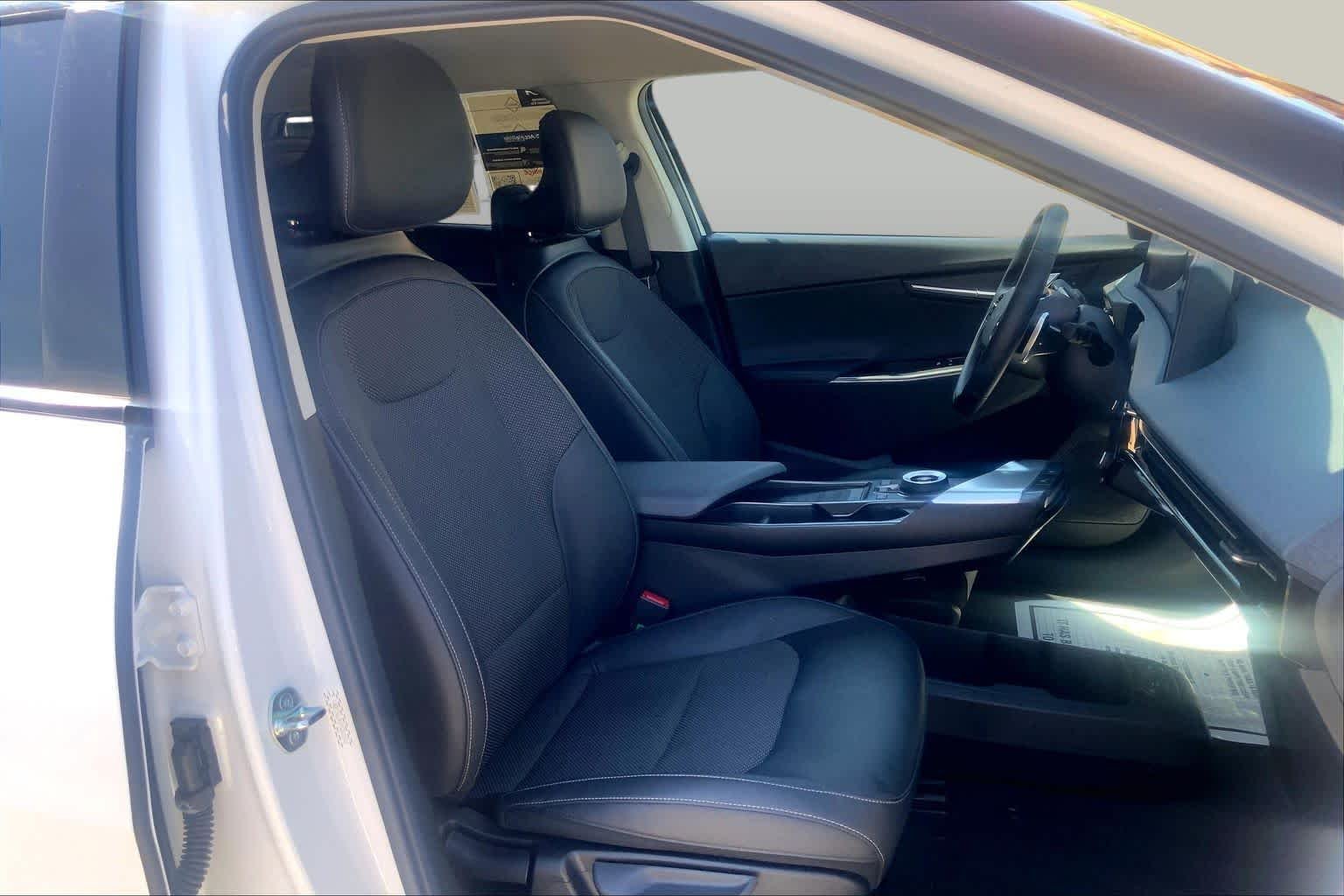 Certified Used 2024 Snow White Pearl Kia Light Long Range image 8
