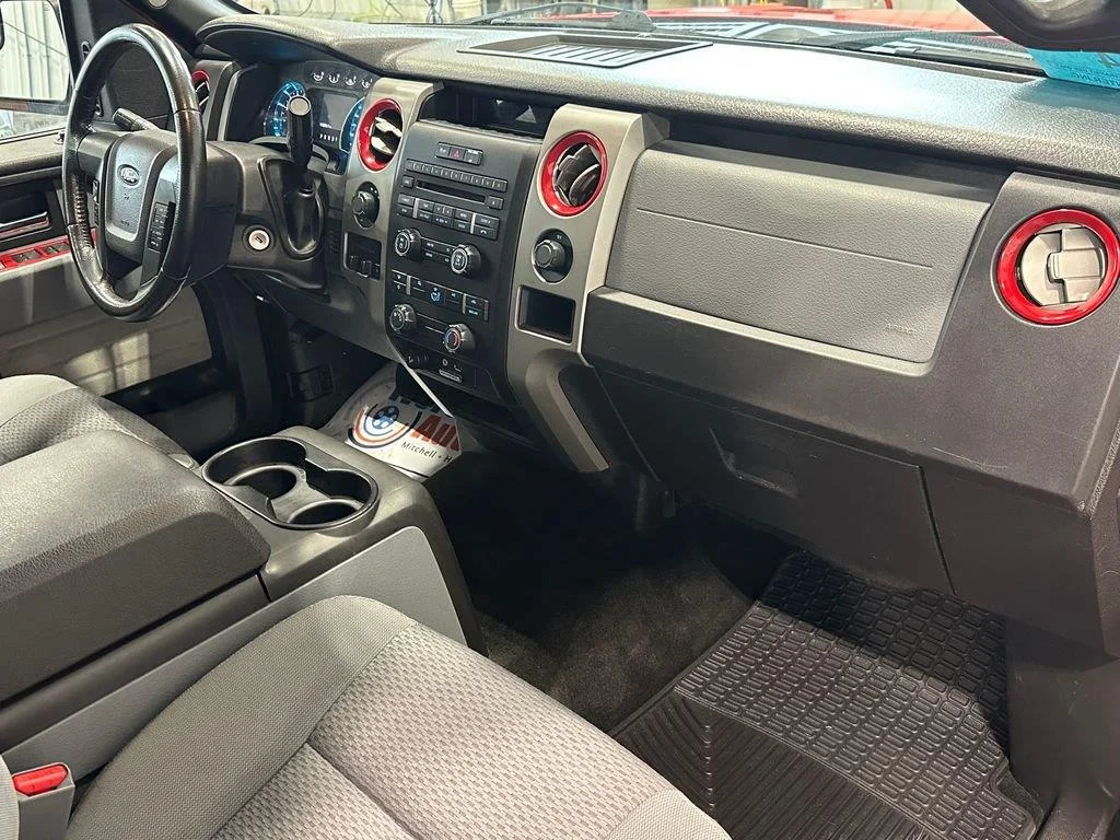 Used 2012 Race Red FORD 4WD SUPERCREW 145