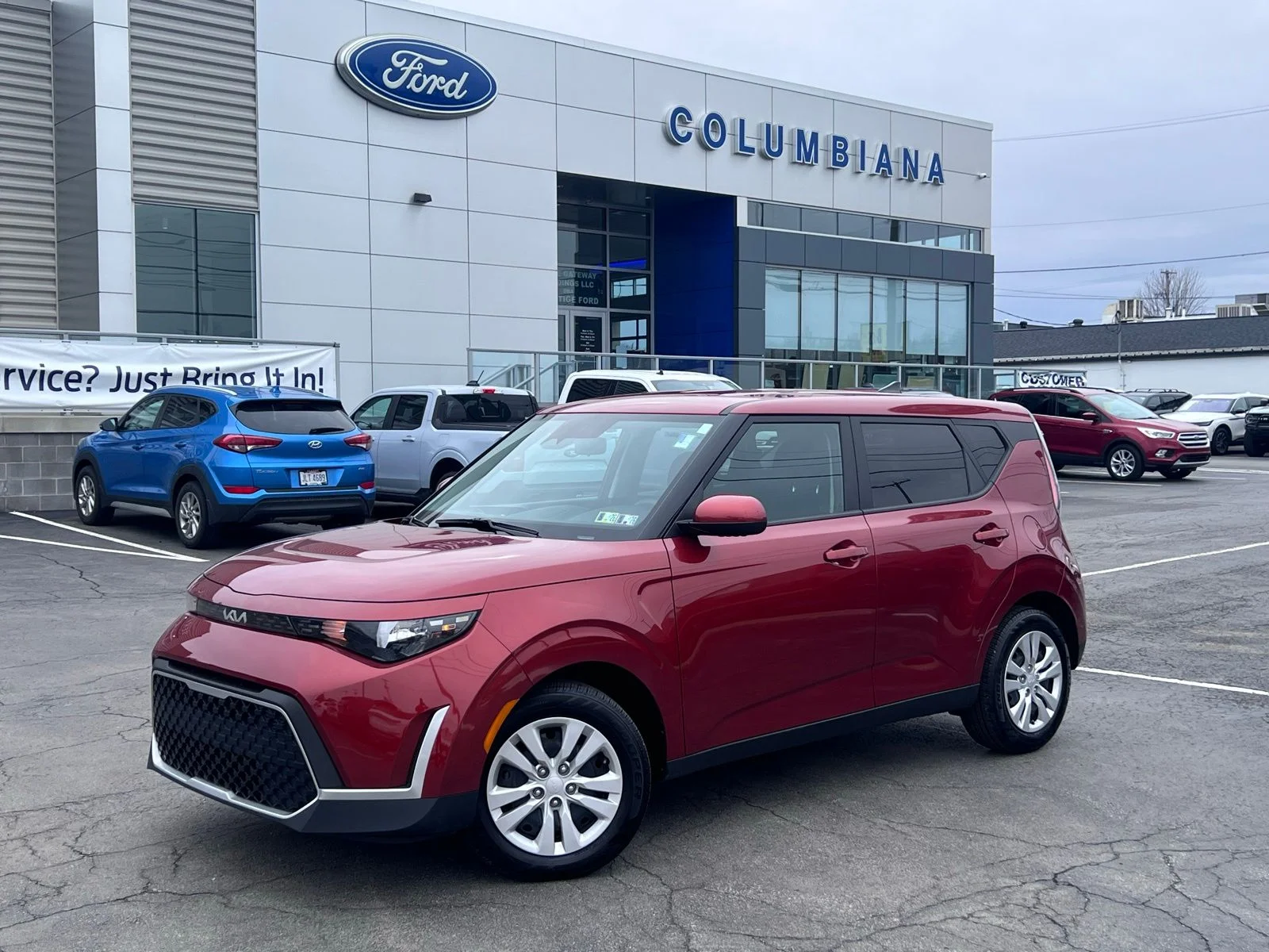 Used 2023 Mars Orange Kia LX image 1