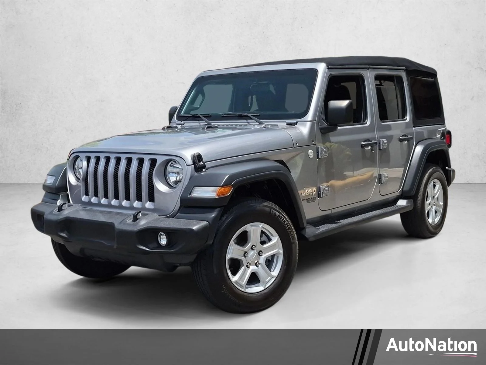 Used 2019 Billet Silver Metallic Clearcoat Jeep Sport S image 1