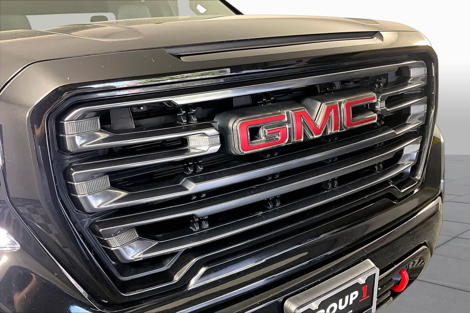 Used 2021 EBONY TWILIGHT METALLIC GMC AT4 image 29