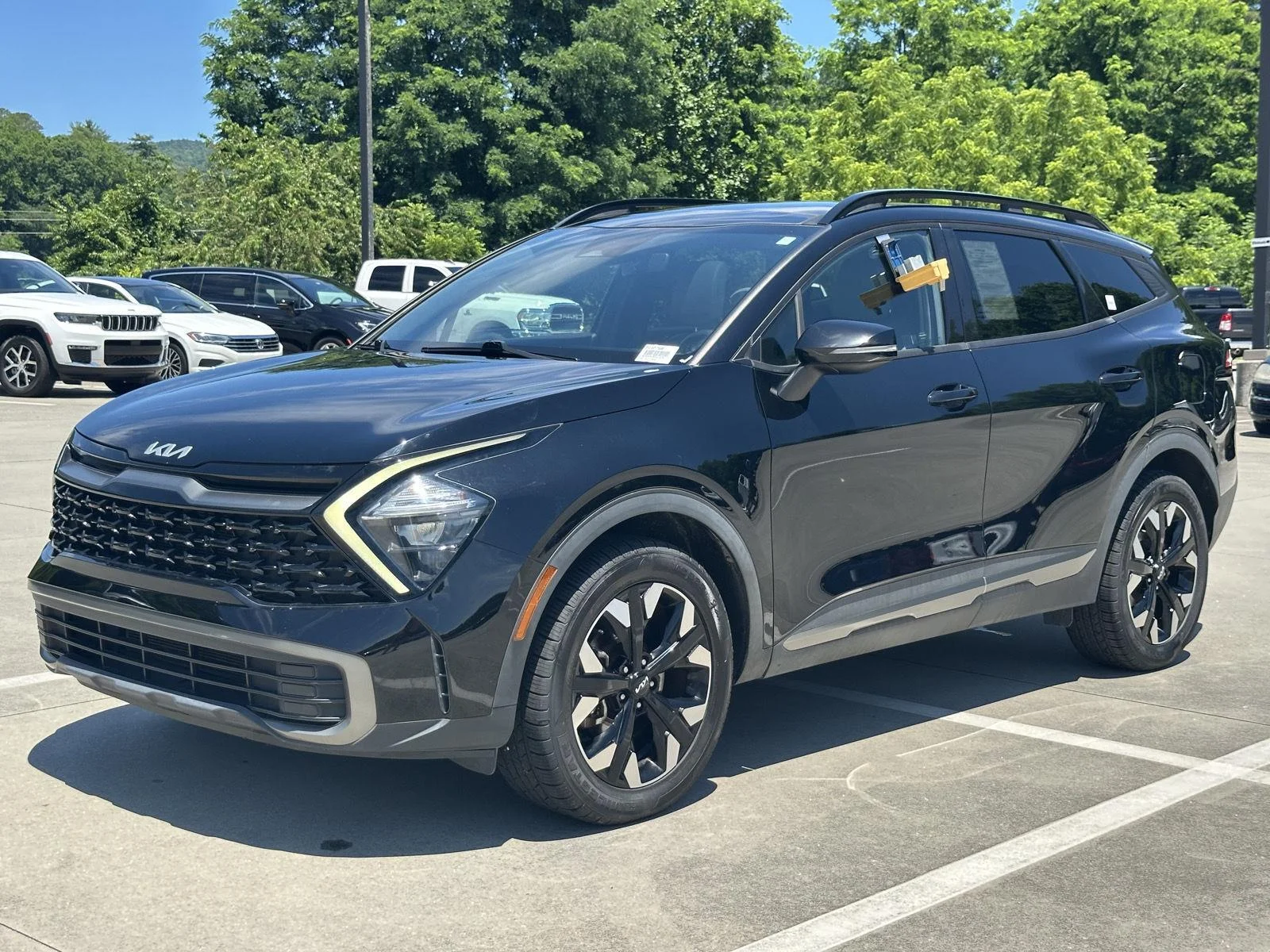 Used 2023 Ebony Black Kia X-Line image 4