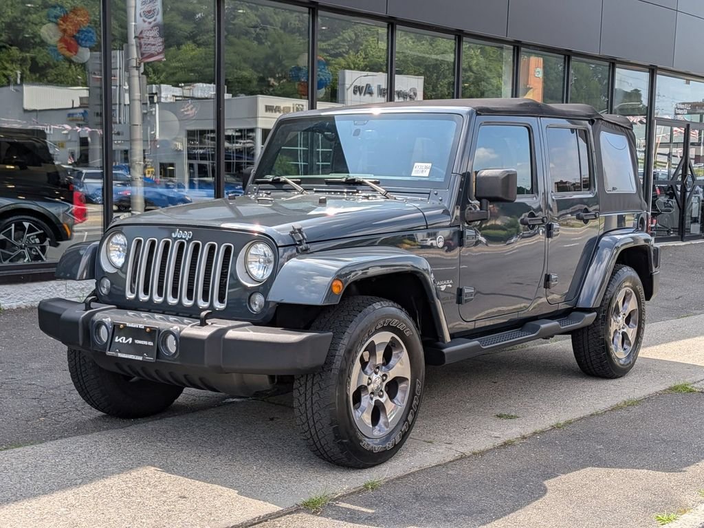 Used 2016 Black Jeep Unlimited Sahara image 2