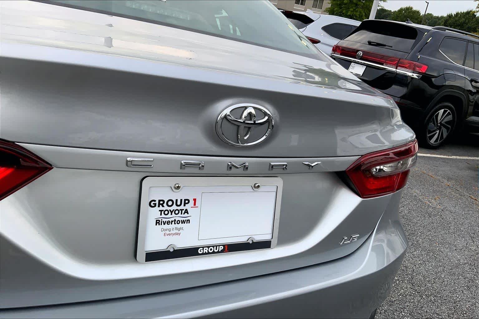 Used 2024 Celestial Silver Metallic Toyota LE image 28