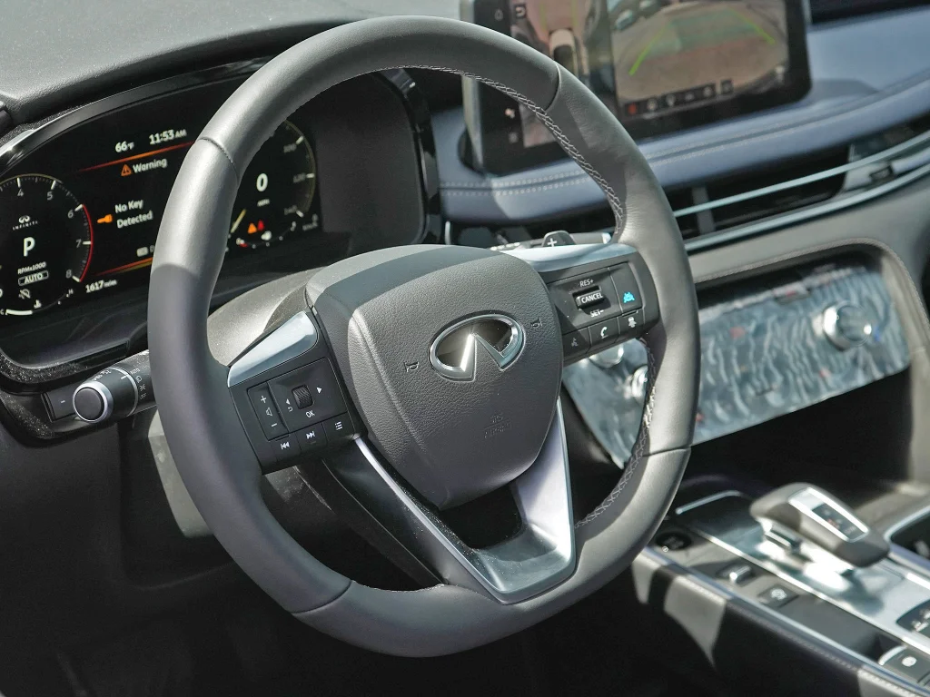 Certified Used 2026 Radiant White/Black Obsidian INFINITI SPORT image 9