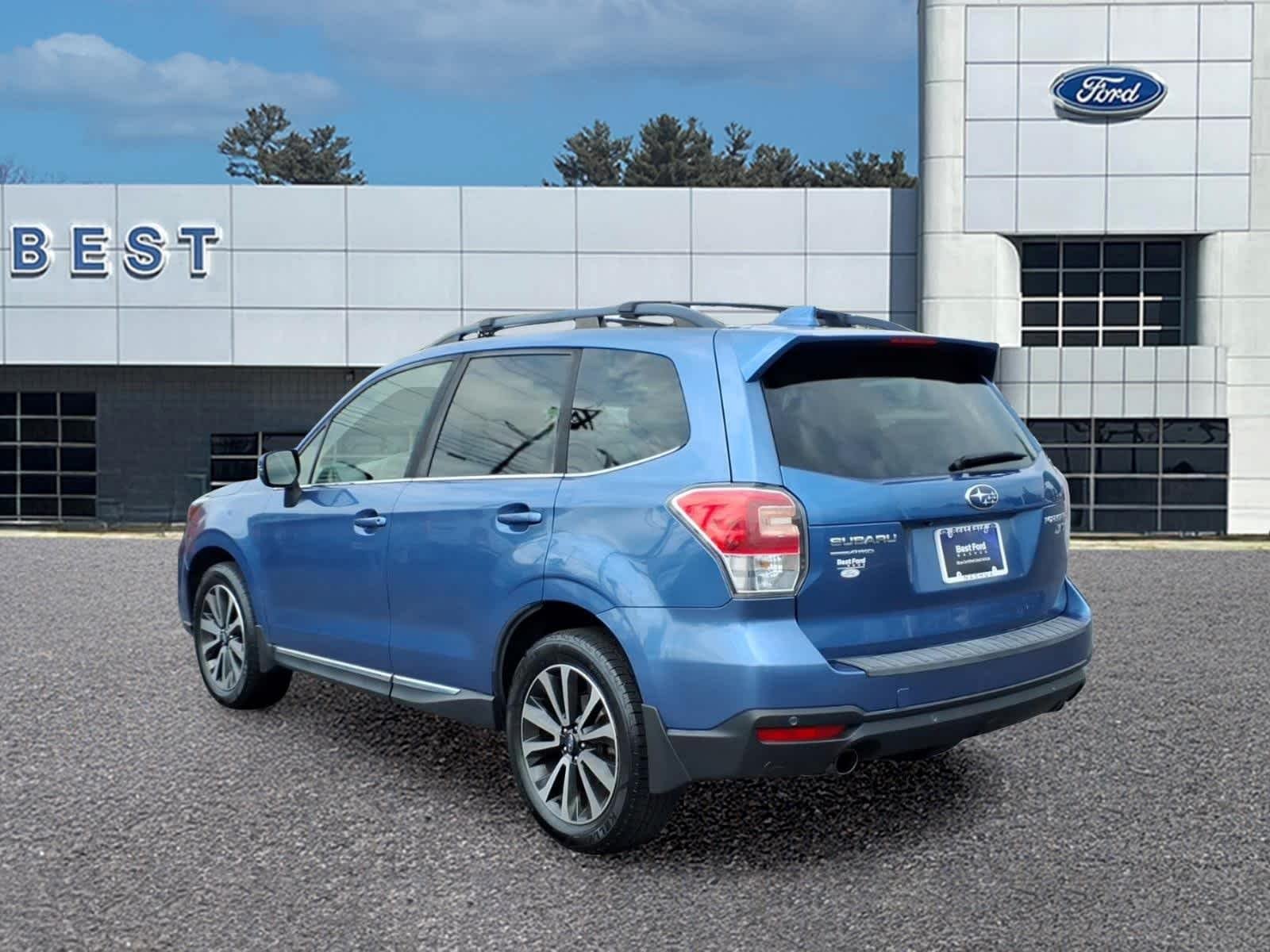 Used 2017 Quartz Blue Pearl Subaru Touring image 4