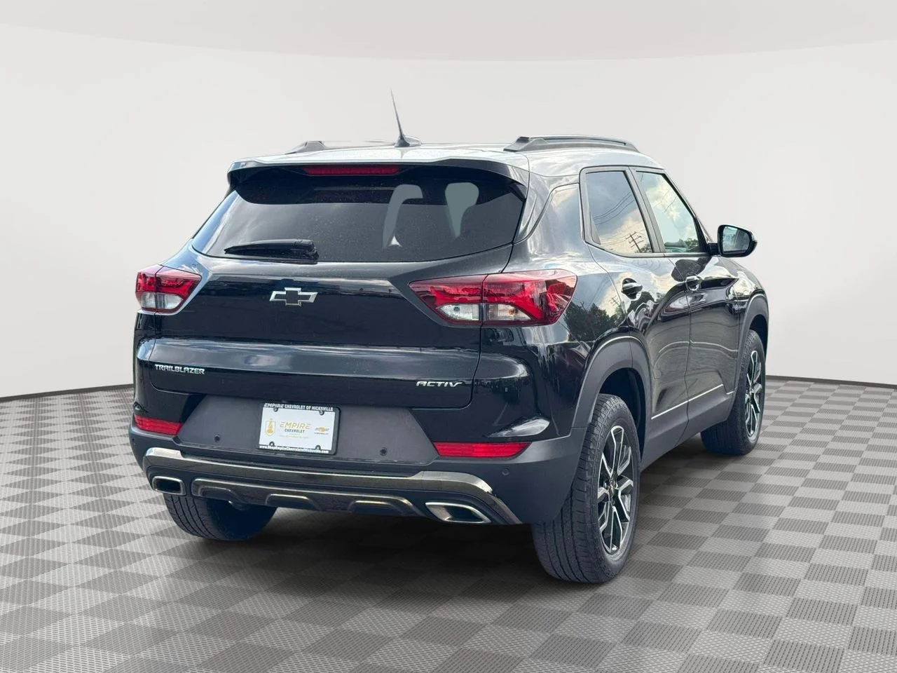 Used 2023 Mosaic Black Metallic Chevrolet FWD ACTIV image 4
