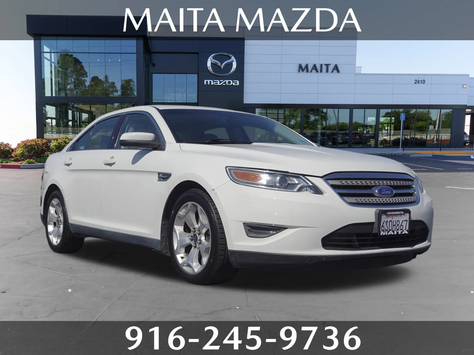 Used 2012 White Suede Ford SEL image 1